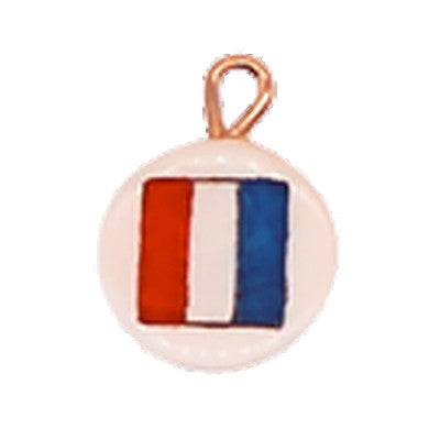 A charm with a red, white, and blue striped flag displayed on a white background.