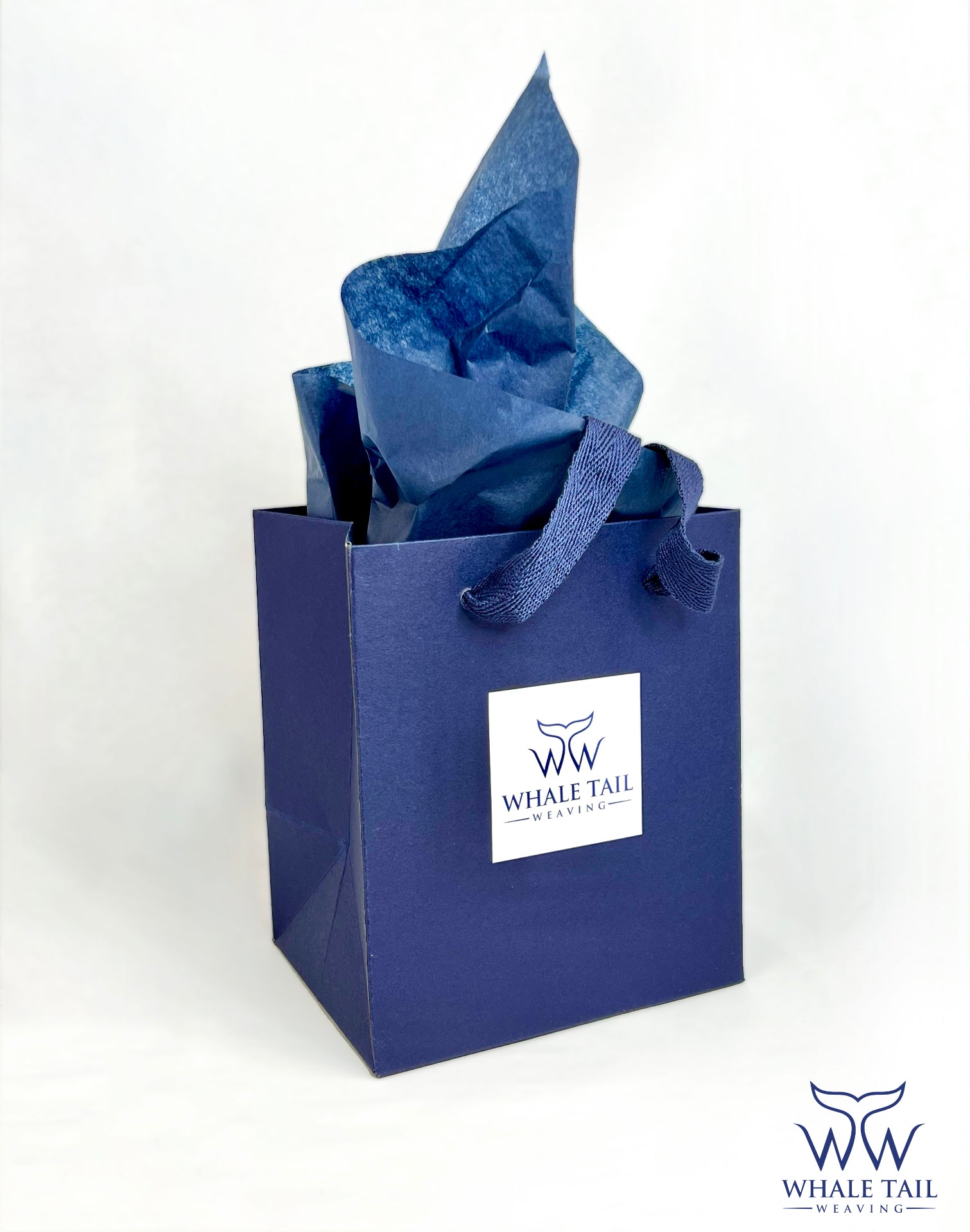 A blue Whale Tail Weaving gift bag, displayed against a white background.